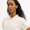 Polos encogidos con el logotipo «Coach Script» en algodón orgánico