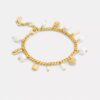 Pulsera con Charms de perlas y corazones