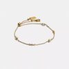 Pulsera deslizante con perlas en forma de C esculpidas