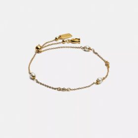 Pulsera deslizante con perlas en forma de C esculpidas