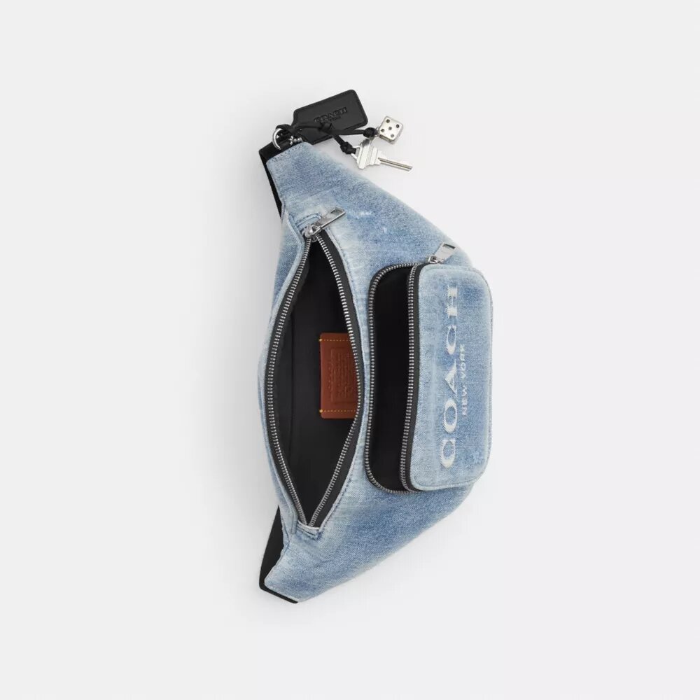 Riñonera Travis 35 en denim desgastado con Charms