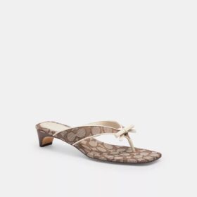 Sandalia de tacón bajo con tiras en forma de lazo en jacquard exclusivo