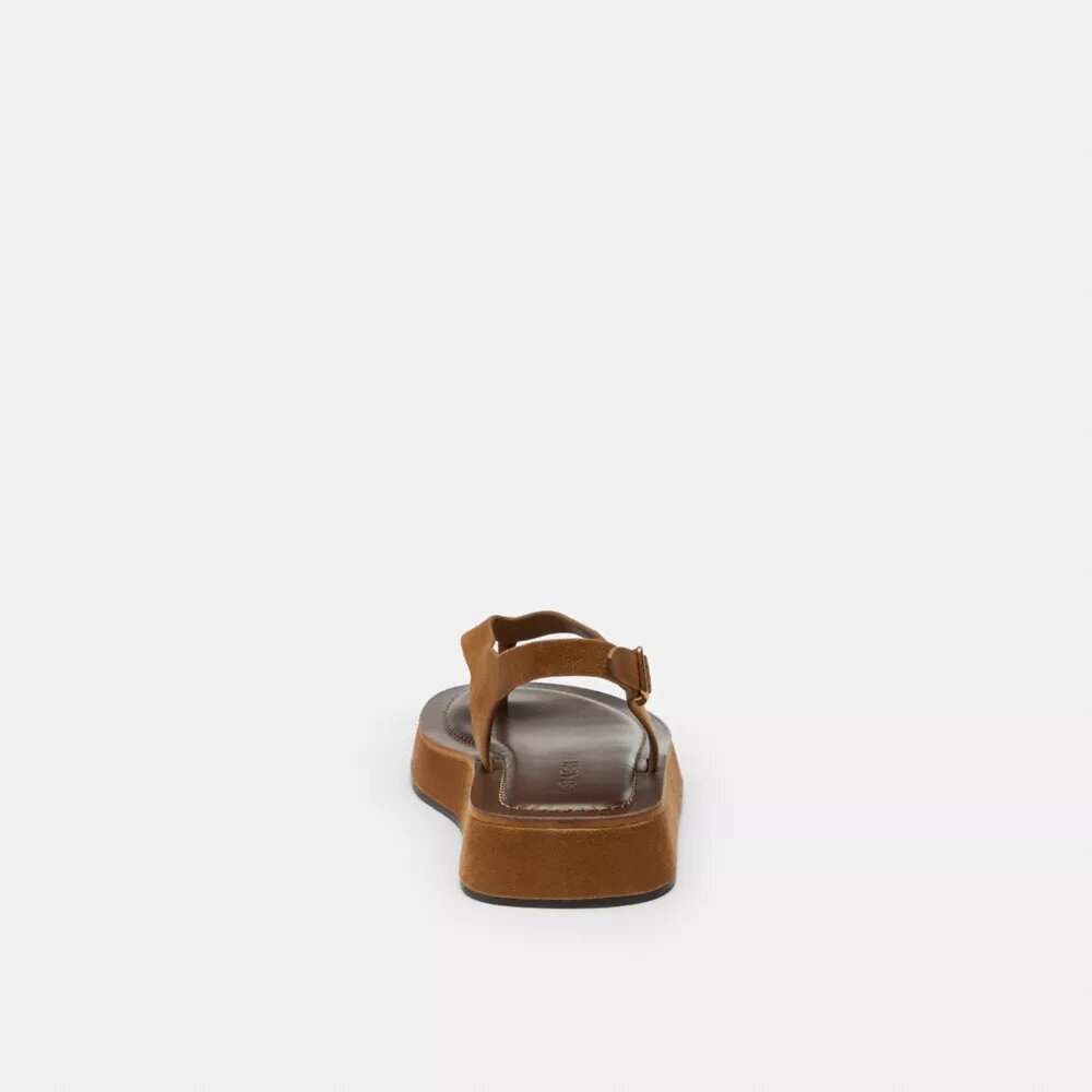 Sandalias de tiras con plataforma y «C» esculpida