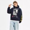 Sudadera con capucha holgada «Dinosaur Collage» de algodón orgánico