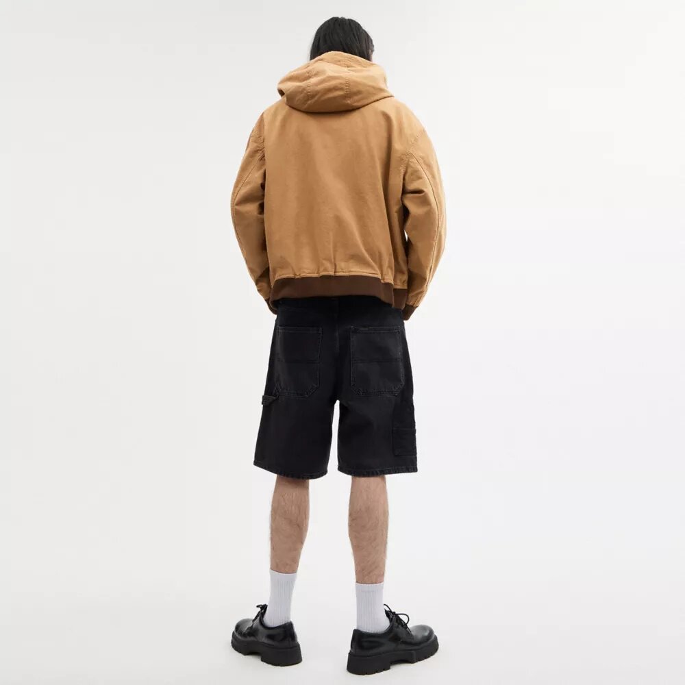 Sudadera con capucha y cremallera de lona