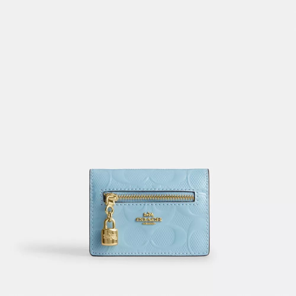 Tarjetero con Charms en piel exclusiva