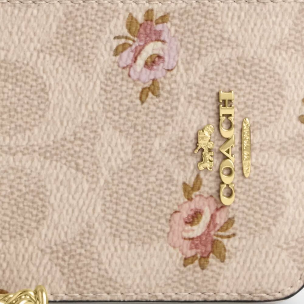 Tarjetero con cremallera de Signature Canvas con estampado floral
