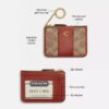 Tarjetero Essential Mini en Signature Canvas