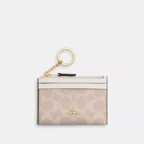 Tarjetero Mini Skinny en Signature Canvas