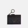 Tarjetero Mini Skinny en Signature Canvas
