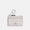 Tarjetero Mini Skinny en Signature Canvas