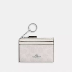 Tarjetero Mini Skinny en Signature Canvas
