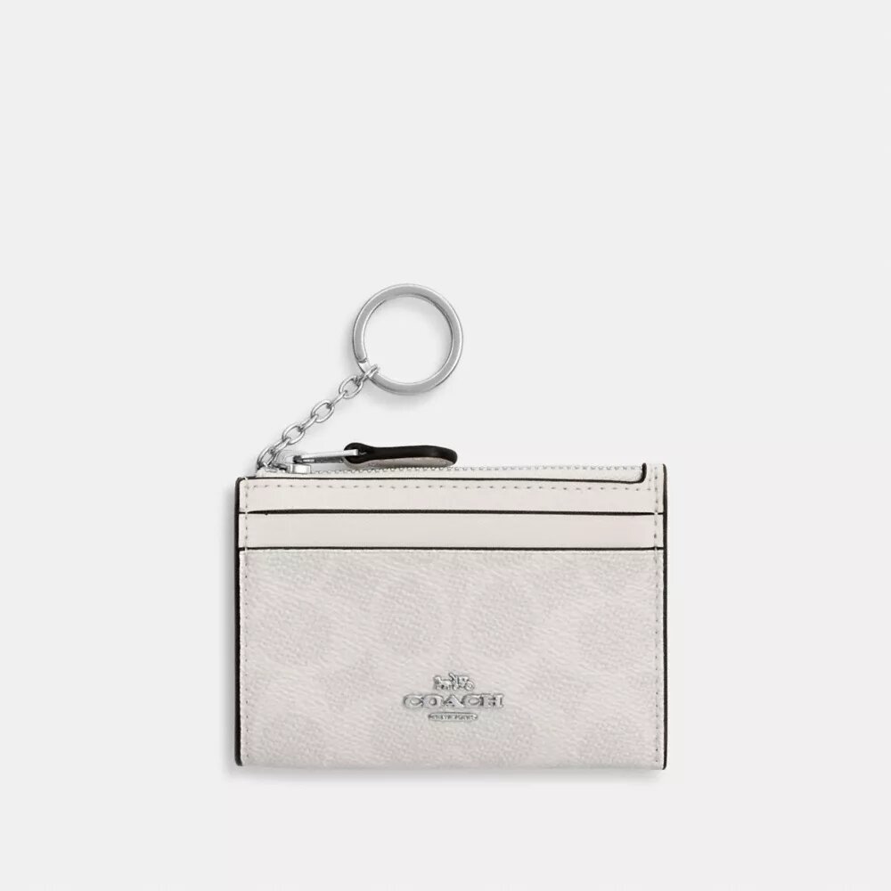 Tarjetero Mini Skinny en Signature Canvas