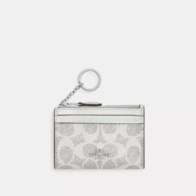 Tarjetero Mini Skinny en Signature Canvas