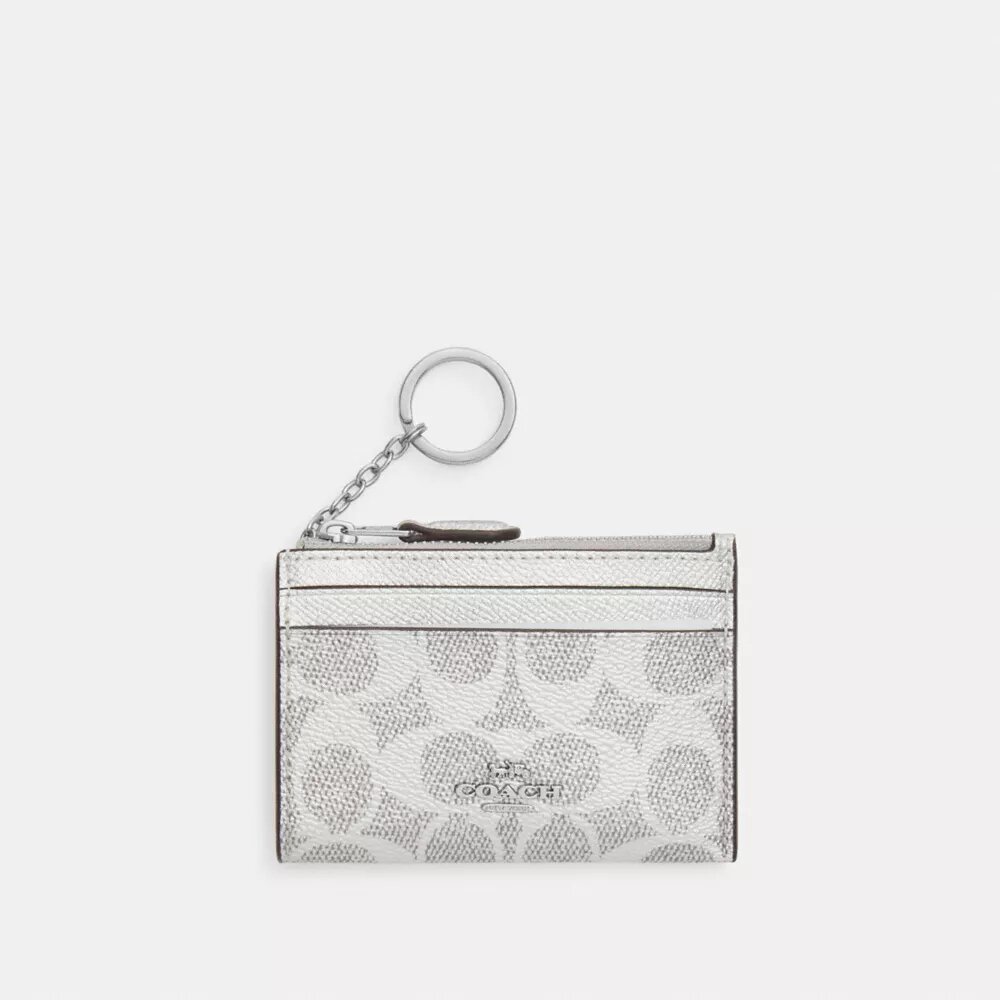 Tarjetero Mini Skinny en Signature Canvas