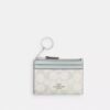 Tarjetero Mini Skinny en Signature Canvas