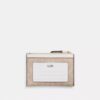 Tarjetero Mini Skinny en Signature Canvas