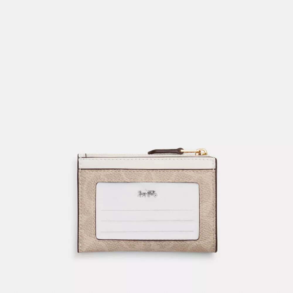 Tarjetero Mini Skinny en Signature Canvas