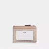 Tarjetero Mini Skinny en Signature Canvas
