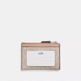 Tarjetero Mini Skinny en Signature Canvas