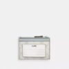 Tarjetero Mini Skinny en Signature Canvas