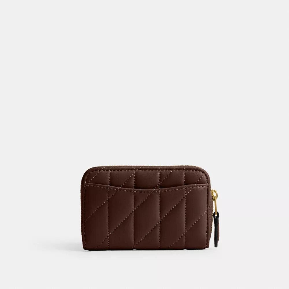 Tarjetero pequeño esencial con cremallera y acolchado tipo almohada
