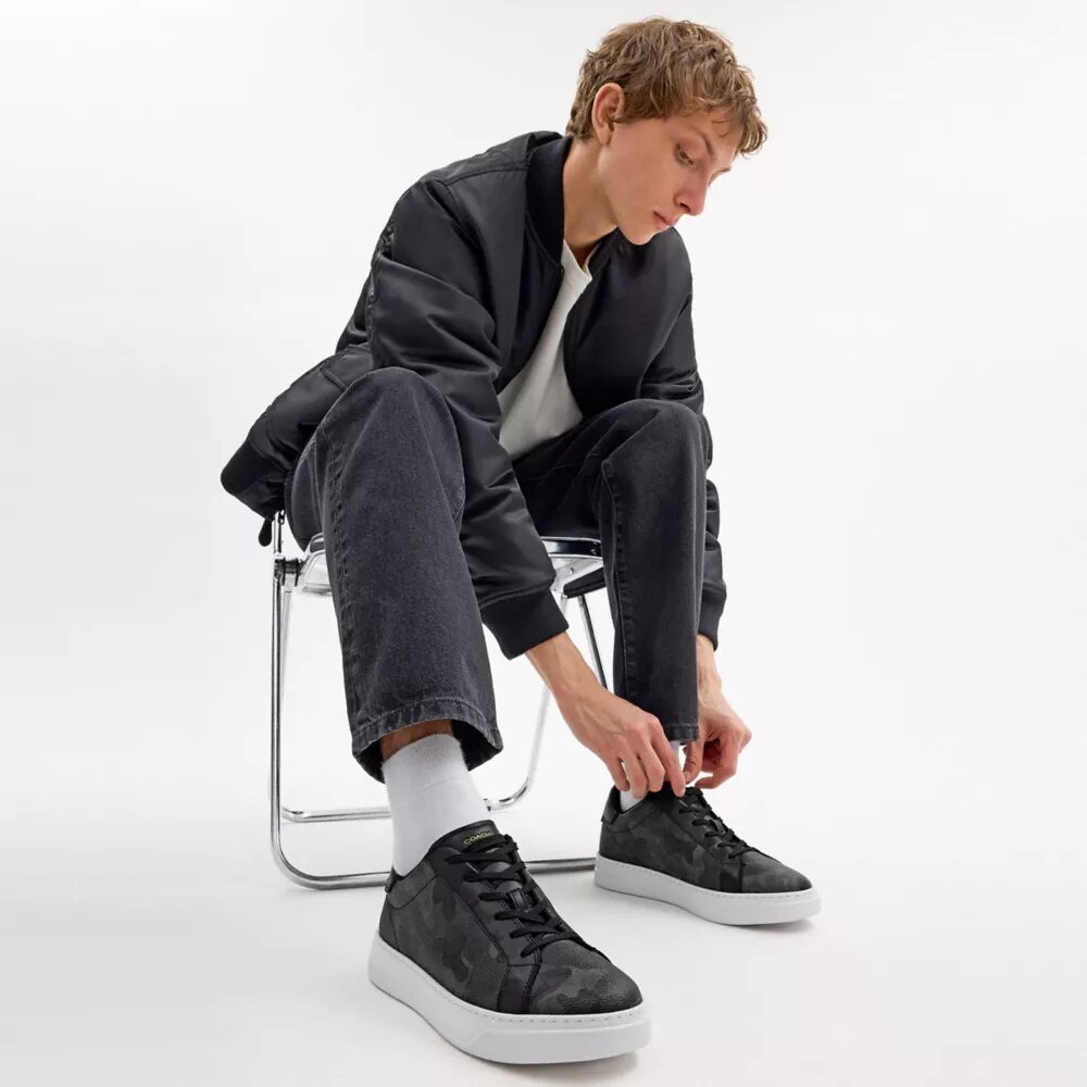 Zapatillas altas con estampado de camuflaje característico
