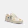Zapatillas altas de Disney x Coach con estampado de pegatinas