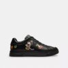 Zapatillas altas de Disney x Coach con estampado de pegatinas