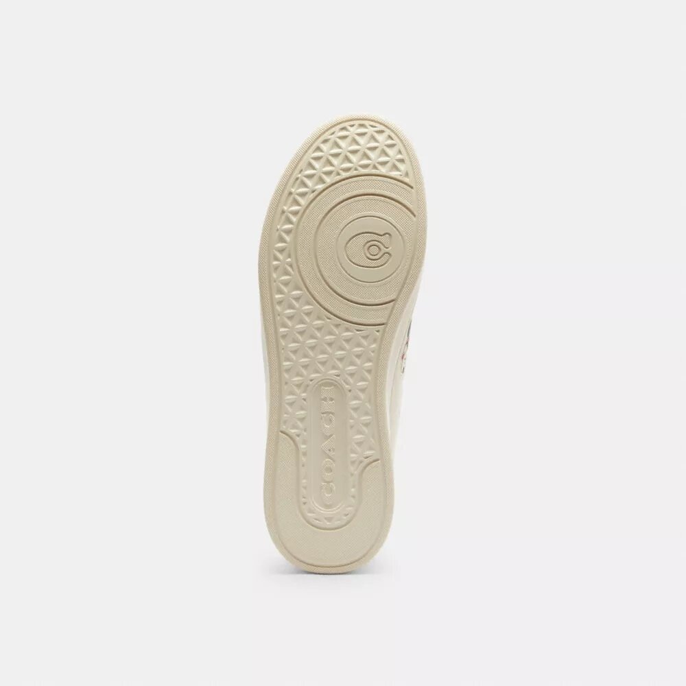 Zapatillas altas de Disney x Coach con estampado de pegatinas