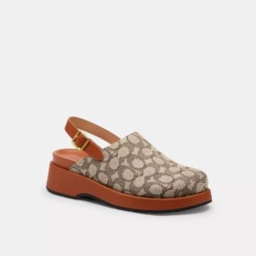 Zuecos de plataforma con «C» esculpida en nuestro característico tejido jacquard