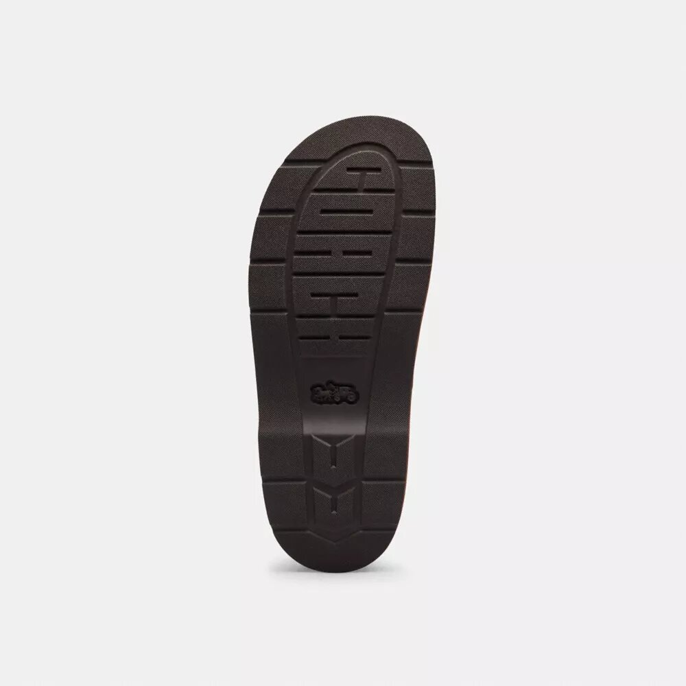 Zuecos de plataforma con «C» esculpida en nuestro característico tejido jacquard