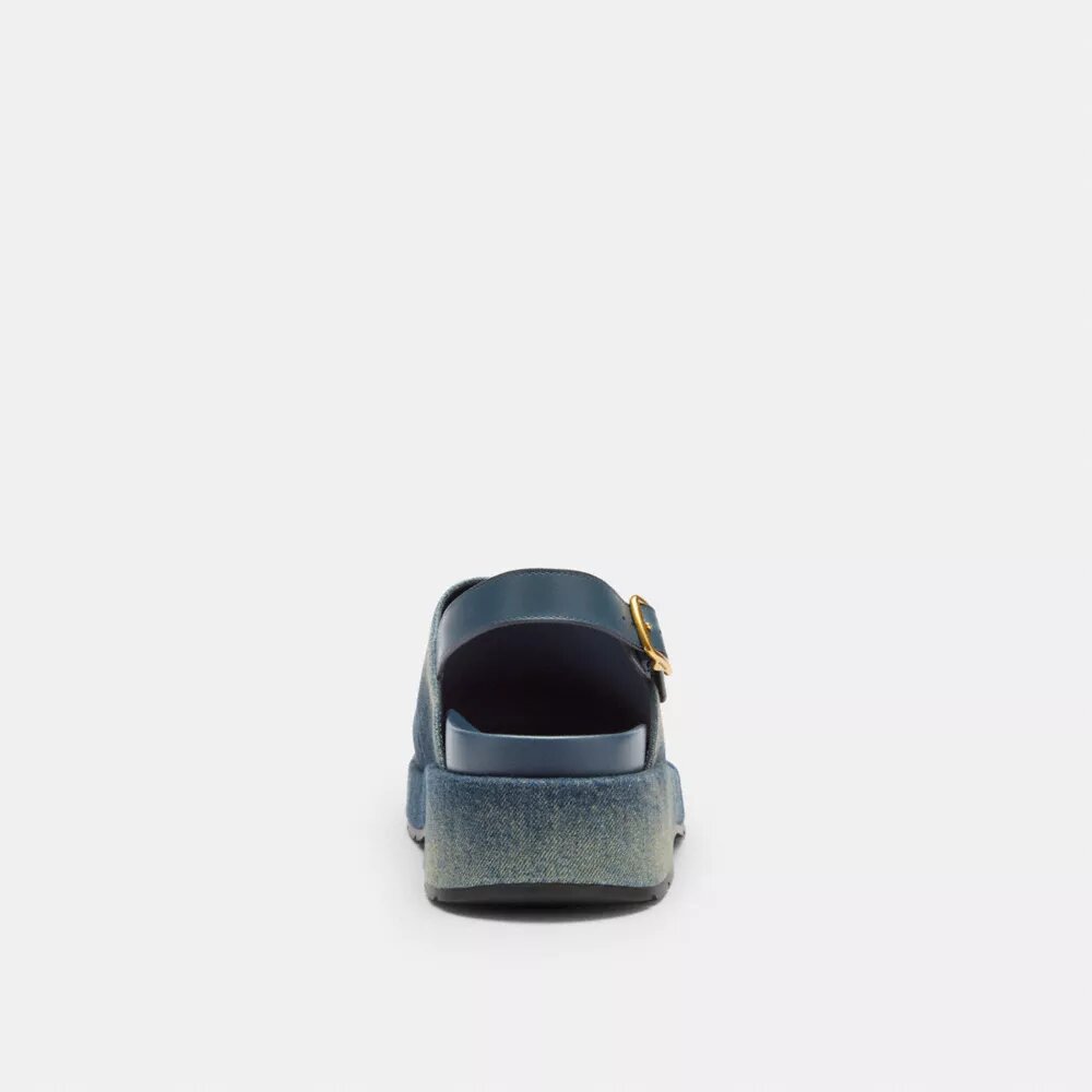 Zuecos de plataforma en forma de «C» en denim desgastado