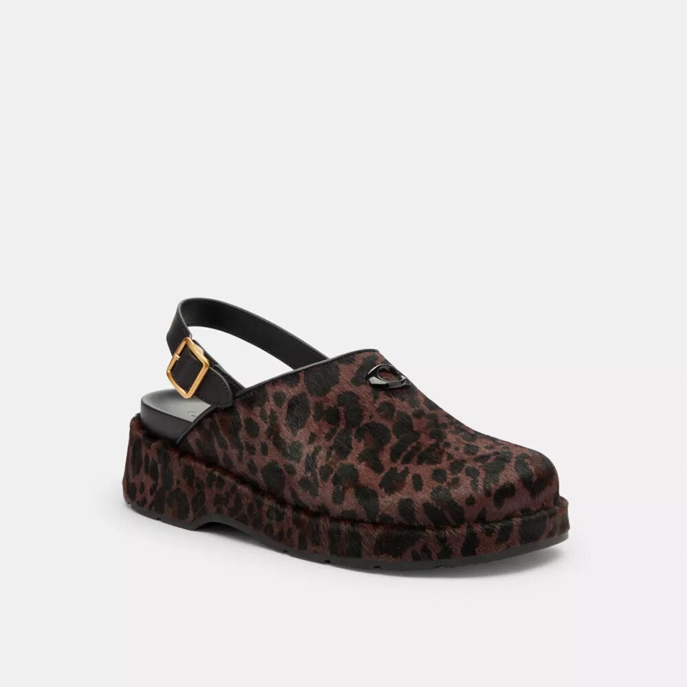 Zuecos de plataforma en forma de «C» y estampado de leopardo
