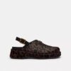 Zuecos de plataforma en forma de «C» y estampado de leopardo