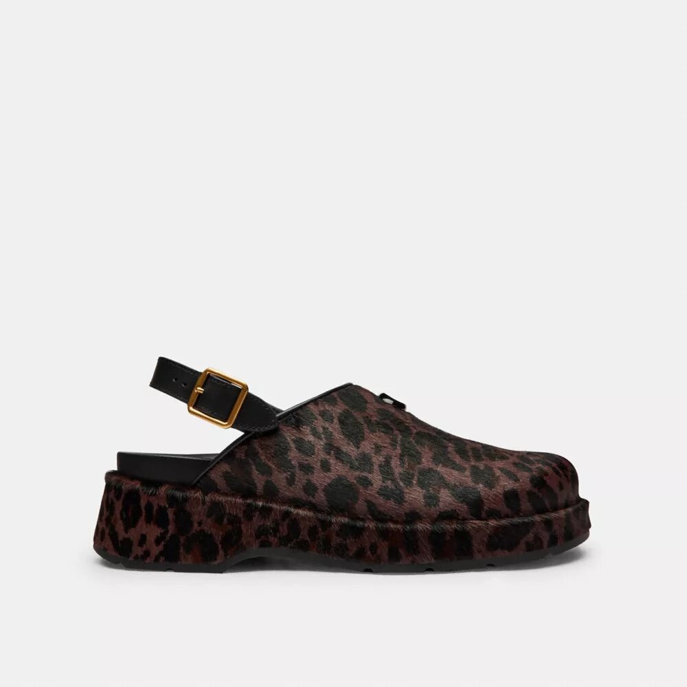 Zuecos de plataforma en forma de «C» y estampado de leopardo