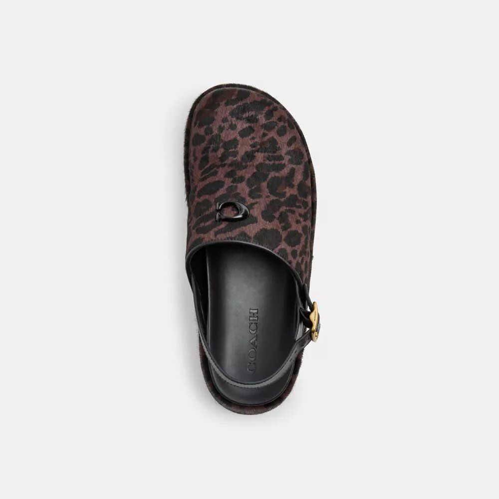 Zuecos de plataforma en forma de «C» y estampado de leopardo