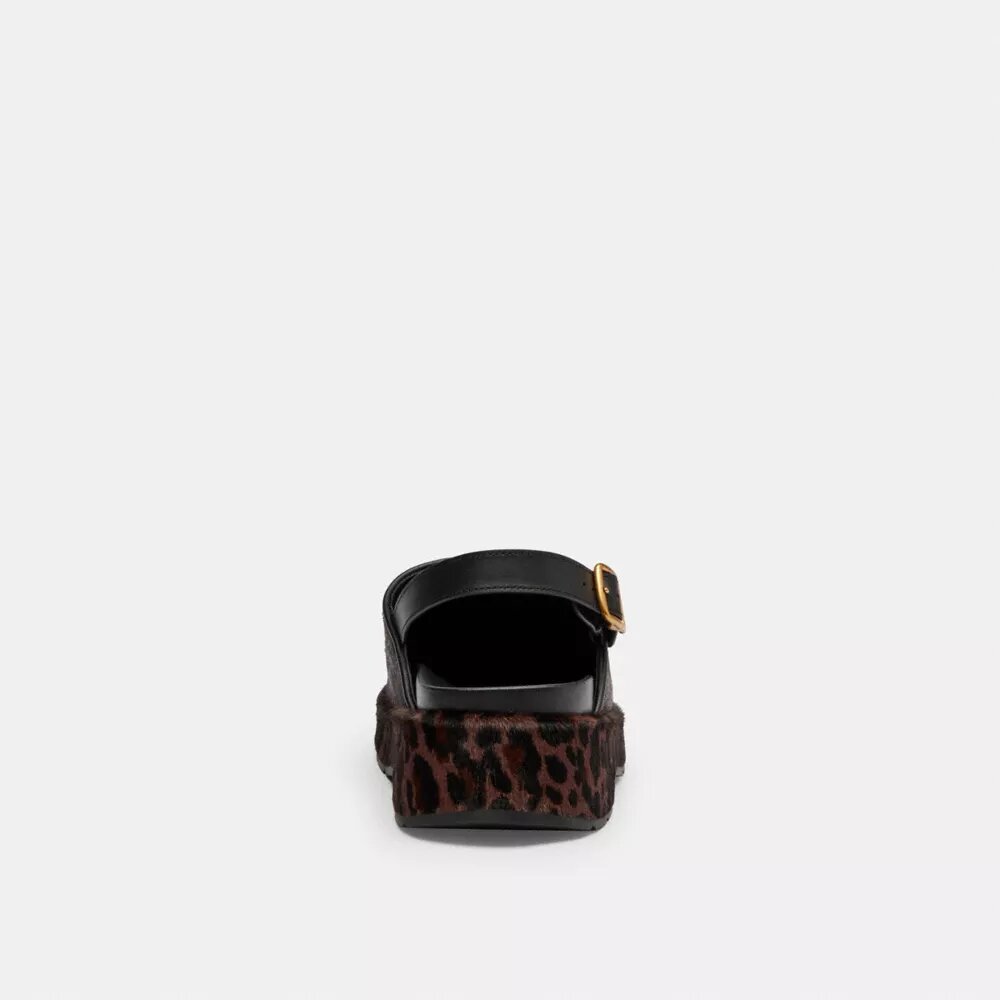 Zuecos de plataforma en forma de «C» y estampado de leopardo